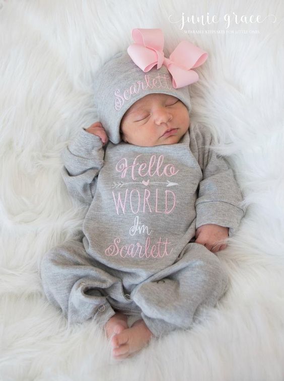 Baby lying in a crib sleeping