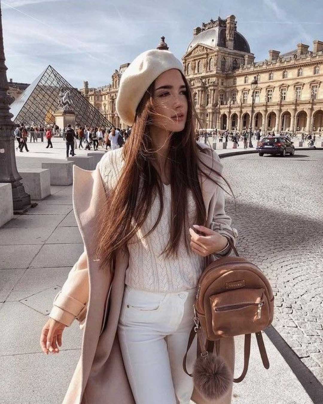 Girl wearing an outfit with her hat 