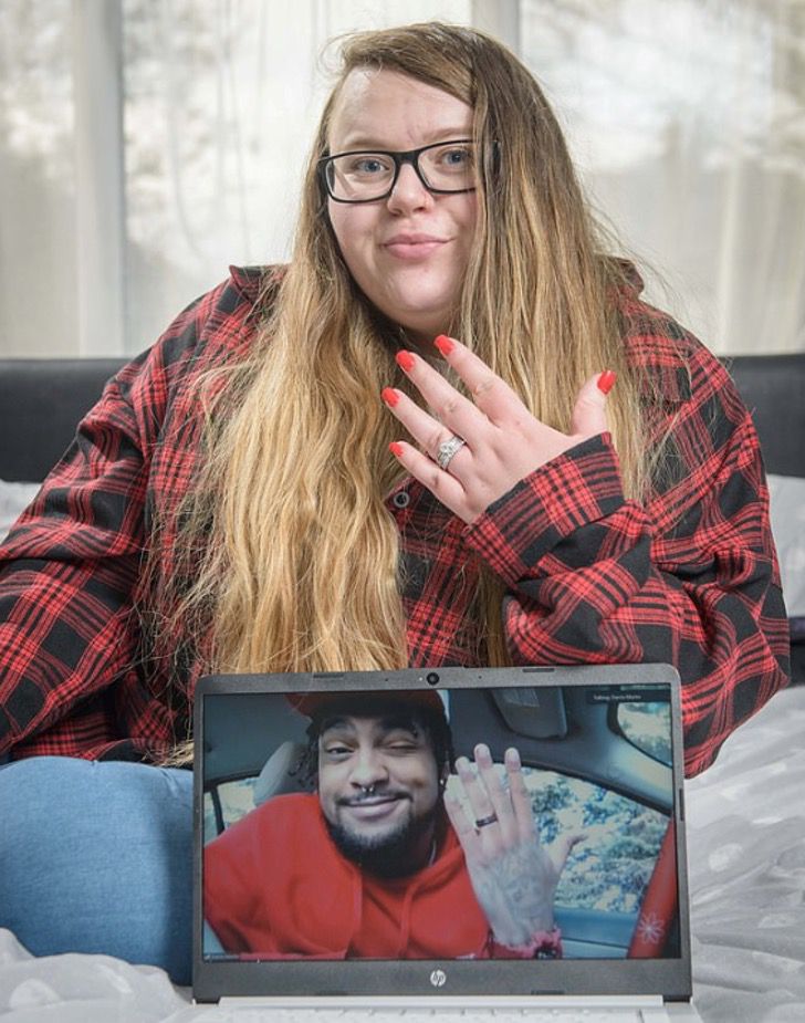 bride and groom showing their rings;  Couple getting married via video call but have never met in person before