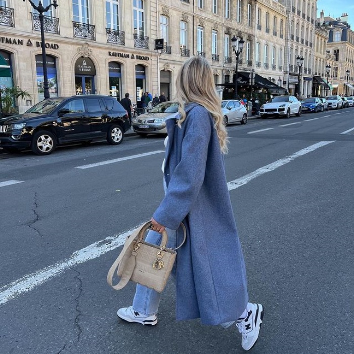 girl, girl, woman with short, long, brown, blond, light, dark hair wearing white tennis shoes, jeans, pants, sweatshirt, coat, oversized blouse, bag, accessories, leather jacket