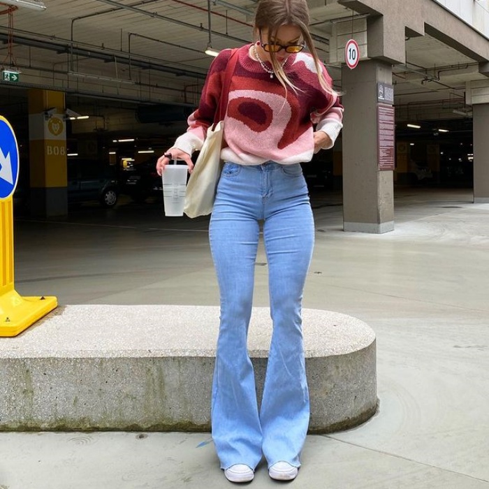 girl, girl, woman with short, long, brown, blond, light, dark hair wearing white tennis shoes, jeans, pants, sweatshirt, coat, oversized blouse, handbag, accessories, leather jacket