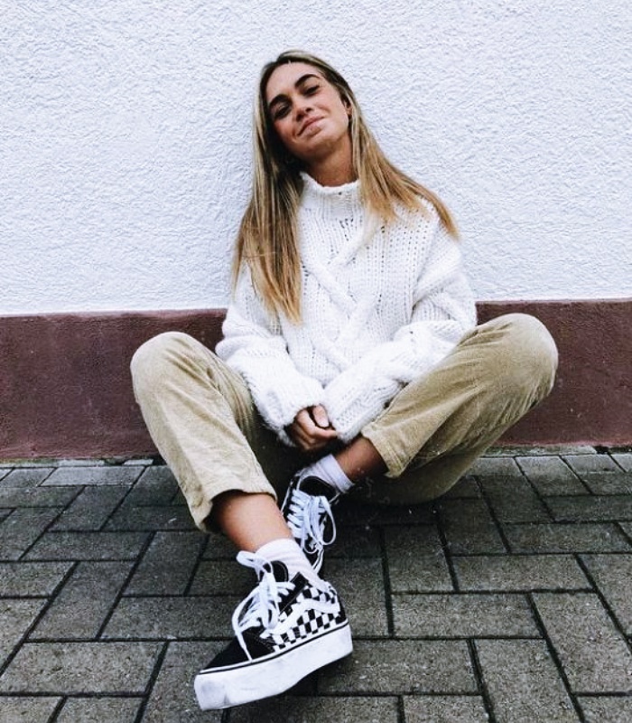 girl, girl, woman with long hair, short, up, dark, blond, black, light wearing platform vans with jeans, pants, coat, sweatshirt, leather bag, sweater