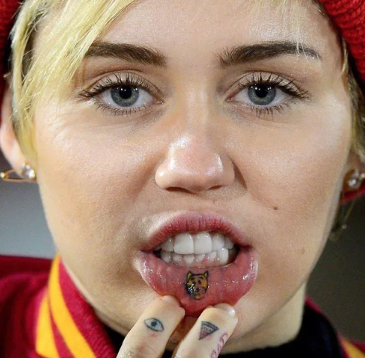 Miley Cyrus with her tattooed lips