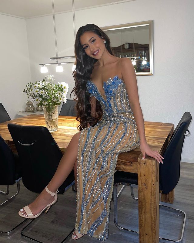 Girl posing in a blue dress 