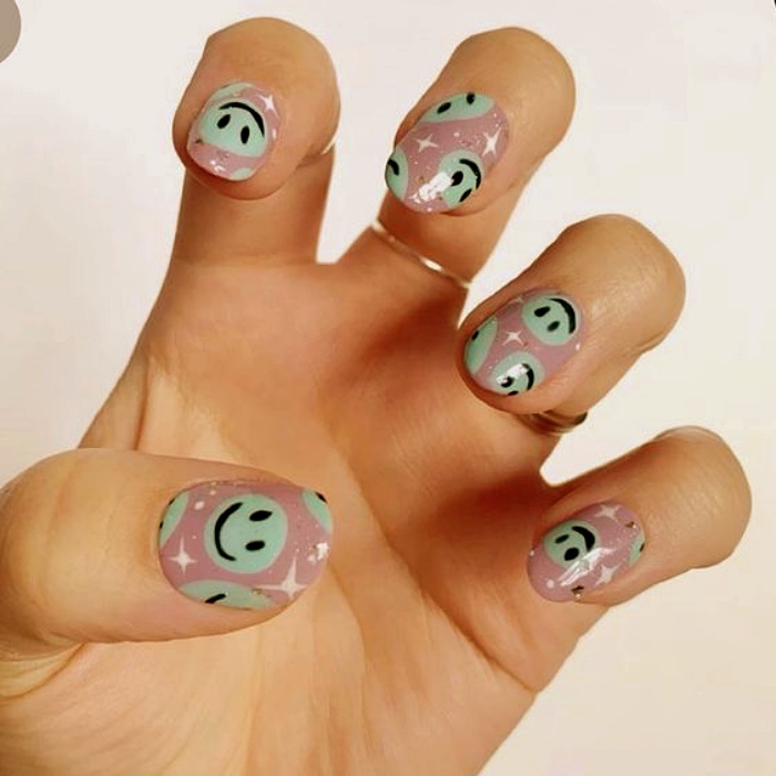 nail design with gelish, acrylics, false nails with happy faces, smiley face, in pink, blue, yellow, green and light blue