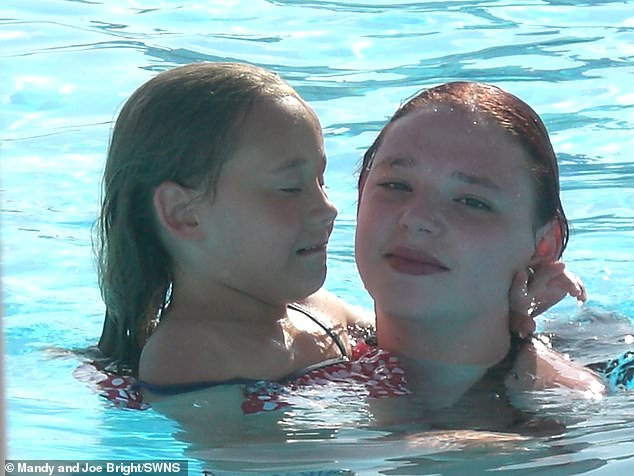 image of two girls in a pool 