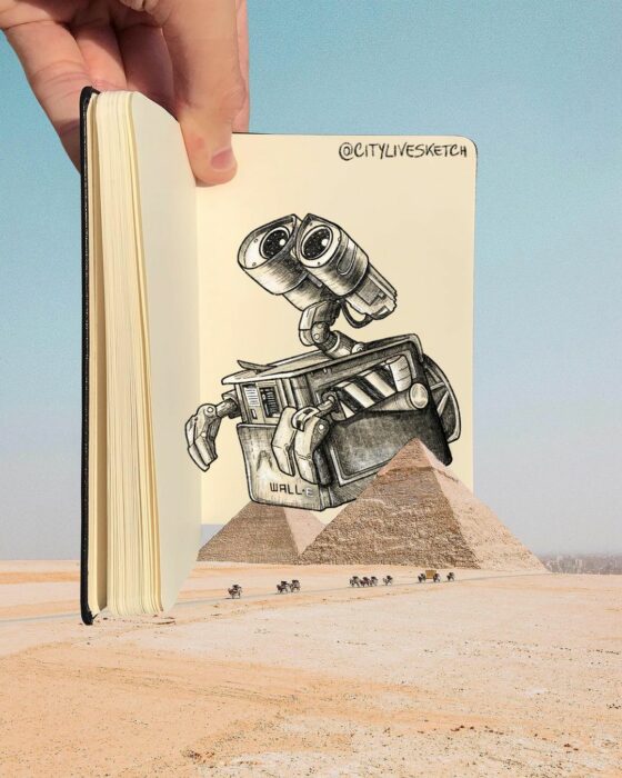 dibujo de Wall-e sobre una imagen de las pirámides en Egipto 