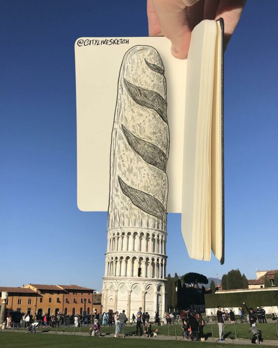 Torre de pisa con un dibujo de un baguette en la parte superior