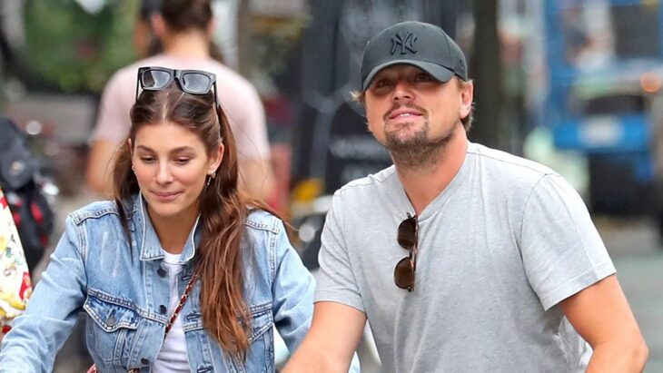 Leonardo DiCaprio and Camila Morrone riding a bike together 