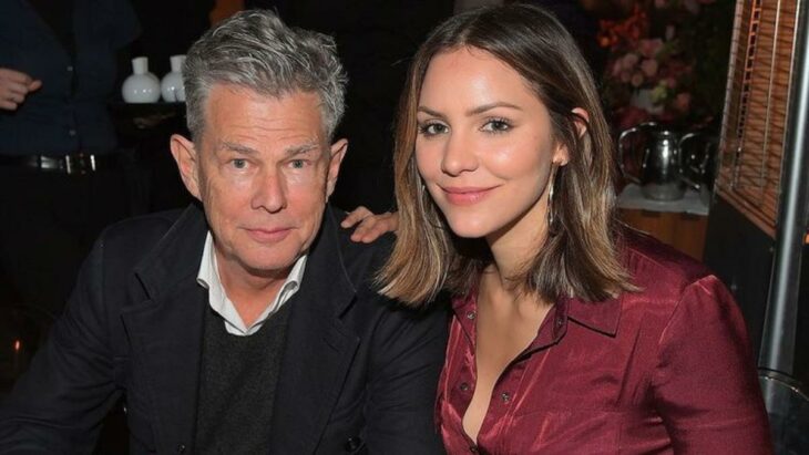 David Foster and Katharine McPhee cuddling while at a restaurant 