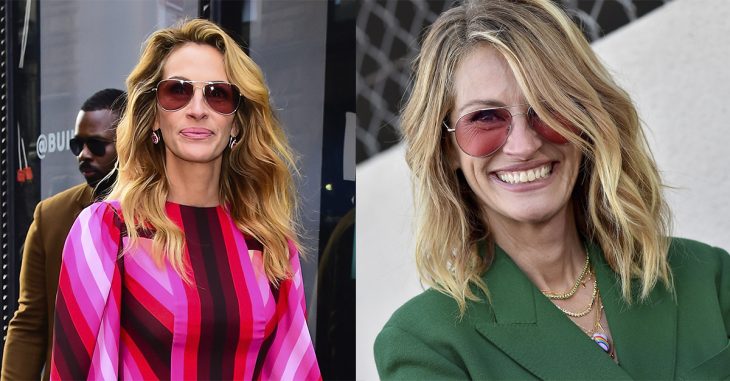 Julia Roberts usando unas gafas de color rojo