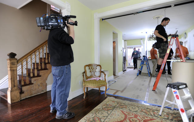 People recording a home renovation show 