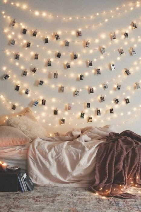 wall with photos; 13 Beautiful ideas to add lights to your bedroom