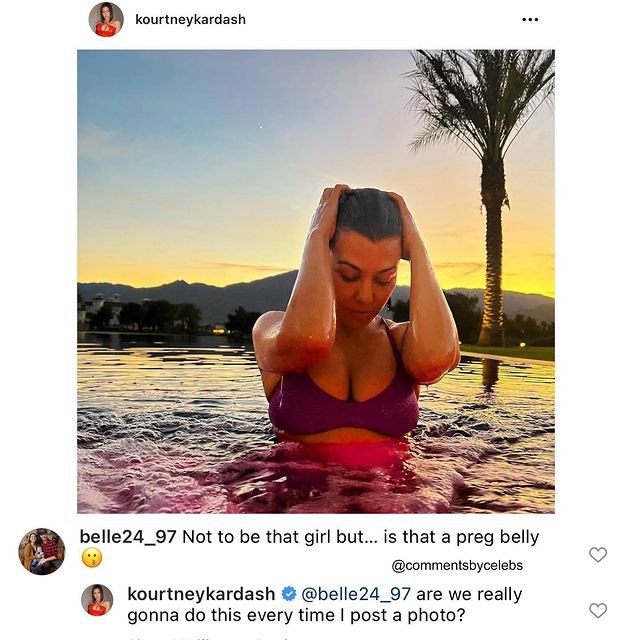 Kourtney Kardashian in a pool enjoying her vacation 