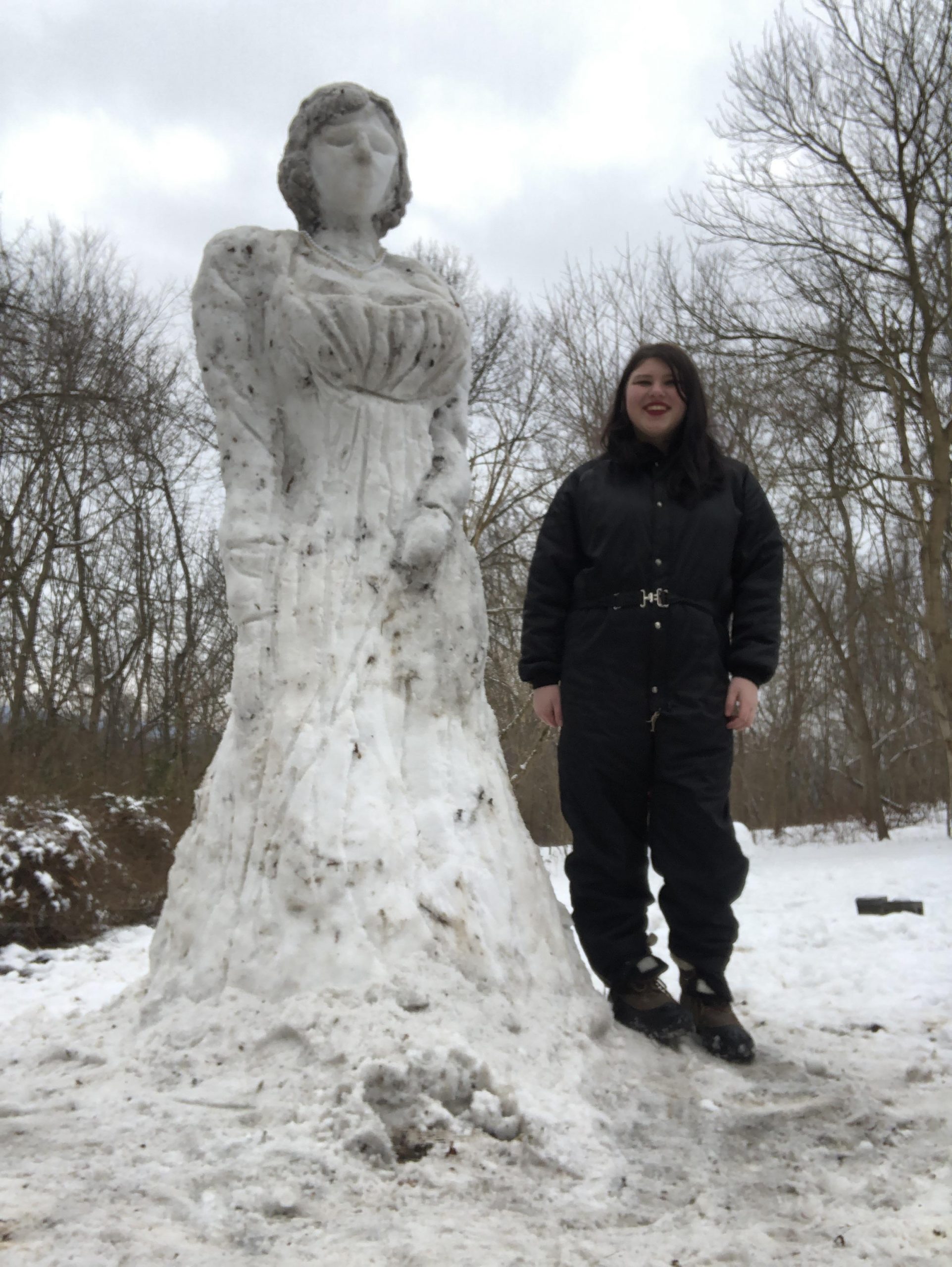 3 meter scale snow sculpture of the character Lady Dimetriscu from the video game Resident Evil 2021
