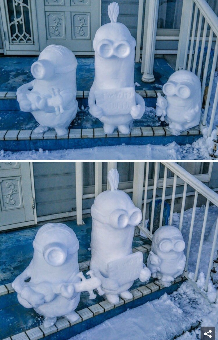 snow sculptures in the shapes of 3 minions 