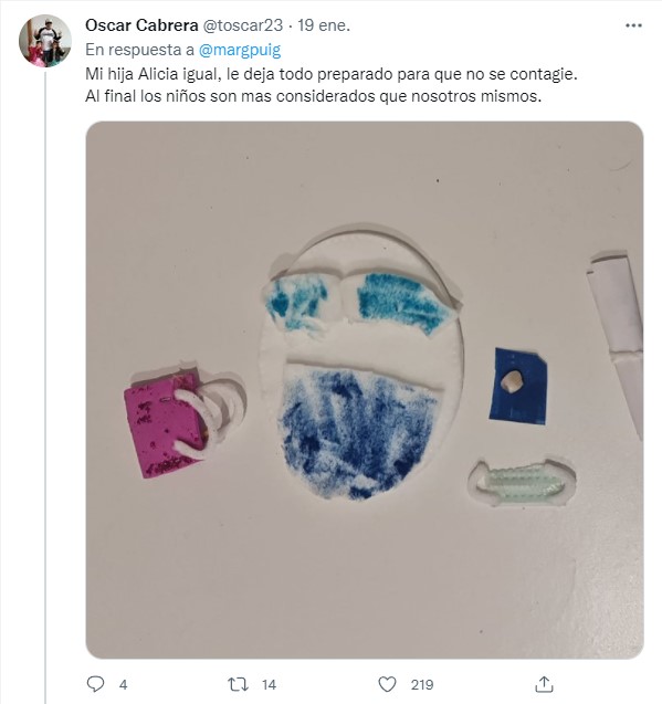 Screenshot of a tweet of a photo of a face mask for a tooth mouse