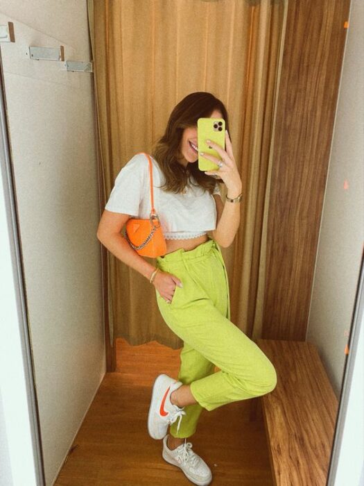 green pants; 20 Ways to wear pastel neon tones in your outfit