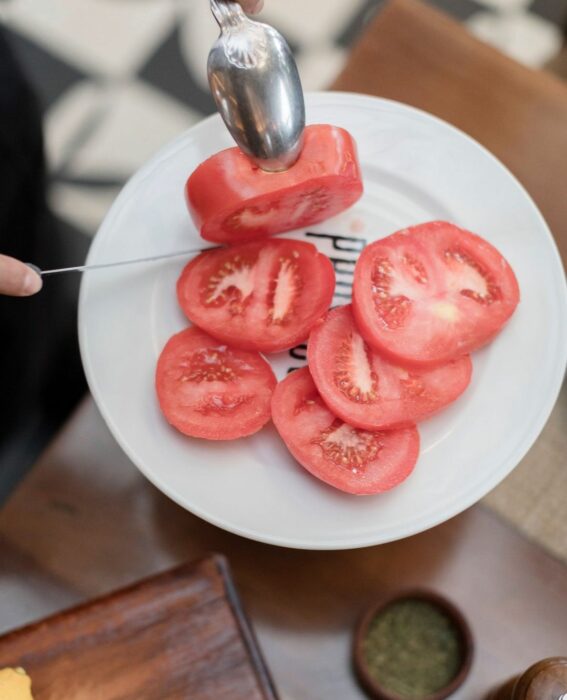 image of a plate with tomato slices 