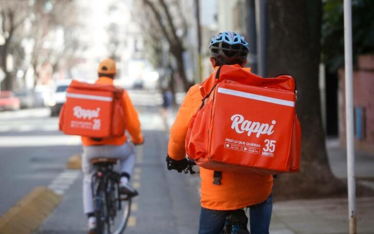 Young delivery man celebrates receiving his engineering degree