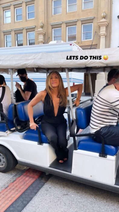 Jennifer Aniston in golf cart