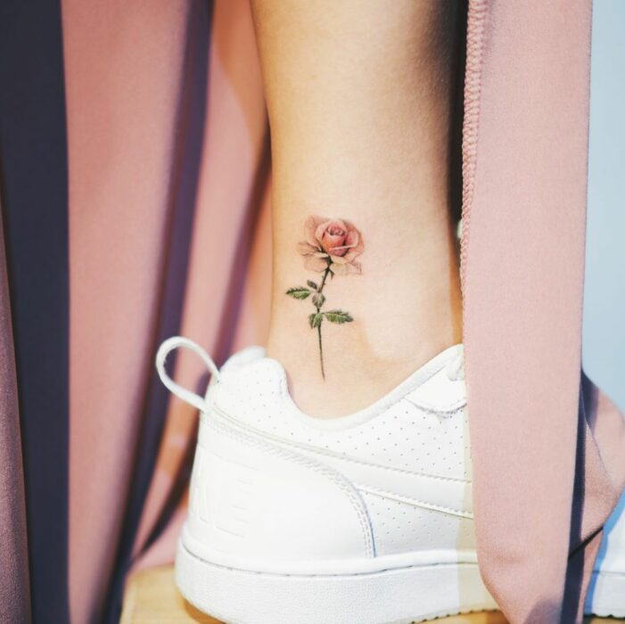 rose tattoo on foot 