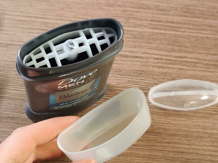 Empty container of Dove deodorant 