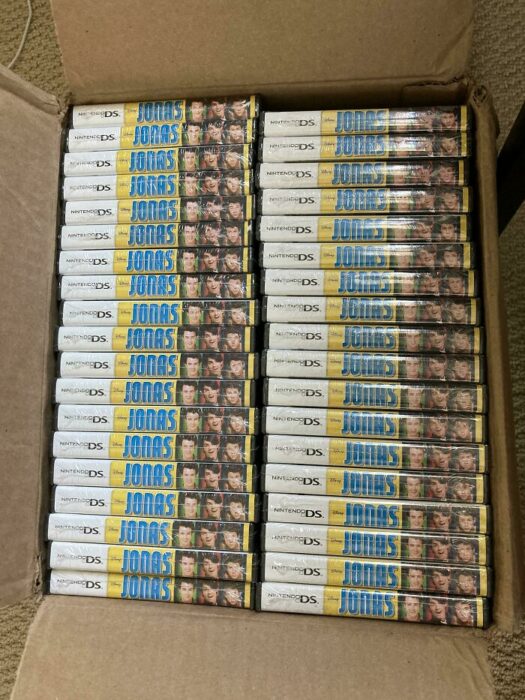 Box with 100 Jonas Brothers DVDs