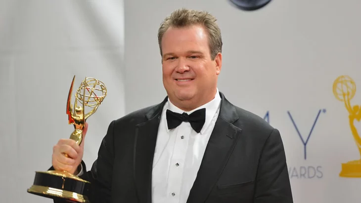 Eric Stonestreet with an Emmy Award