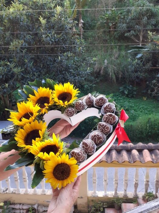 Arrangement of sunflowers and chocolate strawberries for Valentine's Day