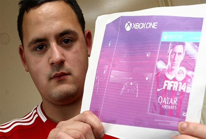 Man showing image of an Xbox