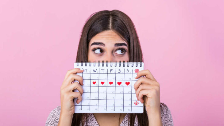 Girl showing a calendar