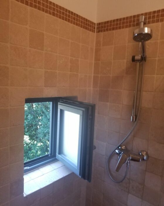 bathroom window; 13 Remodels that disappointed even their creators