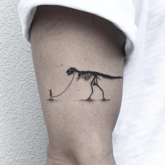 dinosaurio mascota ;tatuajes raros y bonitos que vas a querer llevar (5)