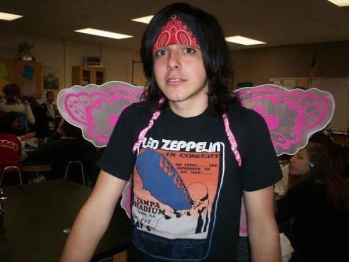 Boy with Led Zeppelin shirt and pink fairy wings