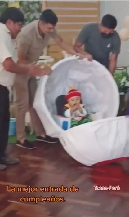 baby dressed as Gohan inside a super saiyan capsule at his birthday party 