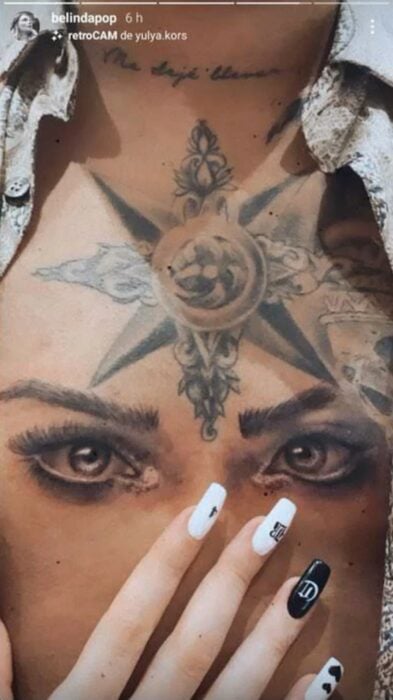 tatuaje de los ojos de Belinda en el pecho de Christian Nodal 