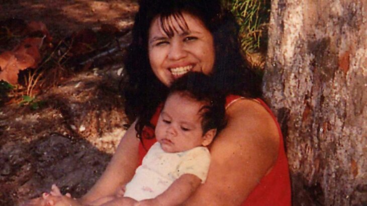 Melissa lucio holding a baby in her arms 