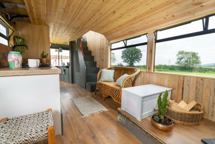 Living room and kitchen inside a bus that became a house 