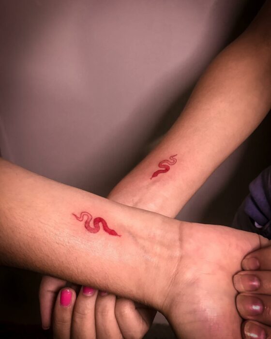 Snakes; 15 pink ink tattoos that will highlight your sensuality