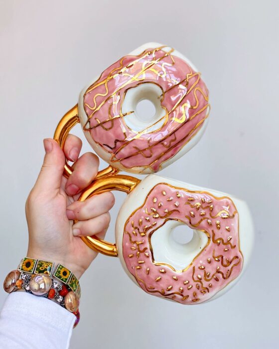 pink donuts;  Artist Creates Donut-Shaped Cups And They're So Cute You Want To Bite On Them