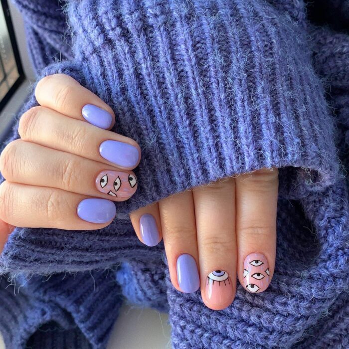 uñas lilas con detalles en ojos turcos 