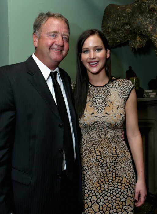 Jennifer Lawrence and Gary Lawrence attending a movie premiere, 2012