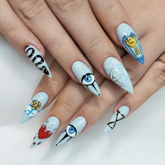 manicura en tonos azul cielo ;Manicuras para abrir tu tercer ojo de bruja y alejar las malas vibras