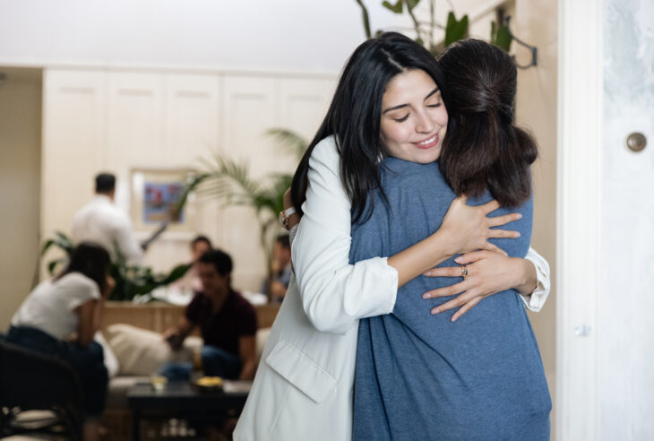 Happy woman hugging her mom