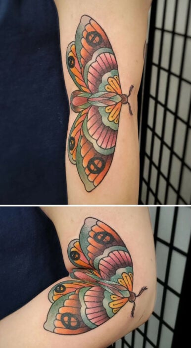 tatuaje de mariposa en la articulación de un codo 