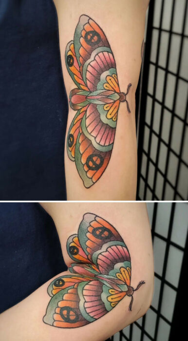 tatuaje de mariposa en la articulación de un codo 