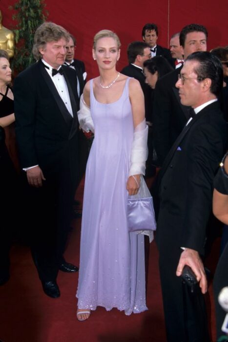 Uma Thurman and Robert Thurman on the red carpet at the Oscars, 1995