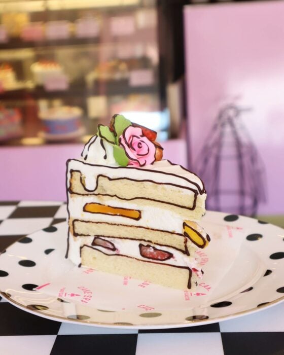 slice with rose; 20 pop art style cakes that look like they came out of a comic