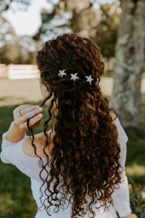 curly hair in half ponytail